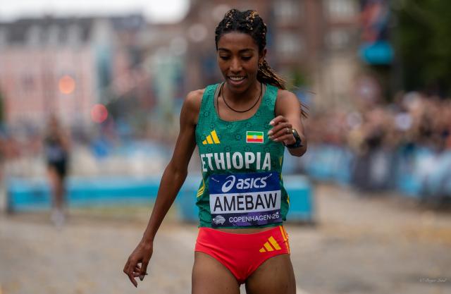 (260920) -- COPENHAGEN, Sept. 20, 2026 (Xinhua) -- Likina Amebaw of Ethiopia smiles after winning the women's 5km race at the World Athletics Road Running Championships in Copenhagen, Denmark, Sept. 19, 2026. (Photo by Anders Kongshaug/Xinhua)