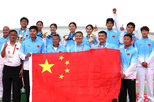 (260920) -- NAGOYA, Sept. 20, 2026 (Xinhua) -- Members of team China celebrate on the podium during the victory ceremony for the women's team of modern pentathlon at the 20th Asian Games Aichi-Nagoya 2026 in Anjo city of Aichi Prefecture, Japan, Sept. 20, 2026. (Xinhua/Yao Qilin)