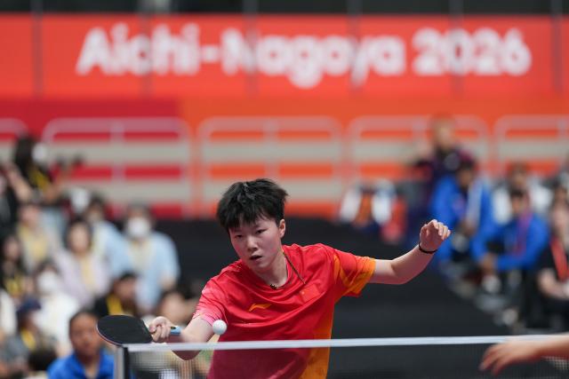 (260920) -- NAGOYA, Sept. 20, 2026 (Xinhua) -- Fan Shuhan of team China competes against Yonggi Poudel of team Nepal during the women's team Group A table tennis match between China and Nepal at the 20th Asian Games Aichi-Nagoya 2026 in Toyota, Japan, Sept. 20, 2026. (Xinhua/Cheong Kam Ka)