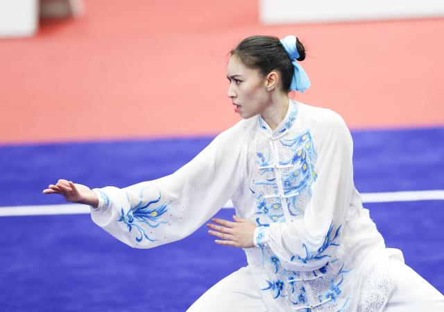 (260920) -- NAGOYA, Sept. 20, 2026 (Xinhua) -- Basma Lachkar of Brunei Darussalam competes during the Taijiquan round of the women's Taijiquan and Taijijian final at the 20th Asian Games Aichi-Nagoya 2026 in Nagoya, Japan, Sept. 20, 2026. (Xinhua/Long Lei)