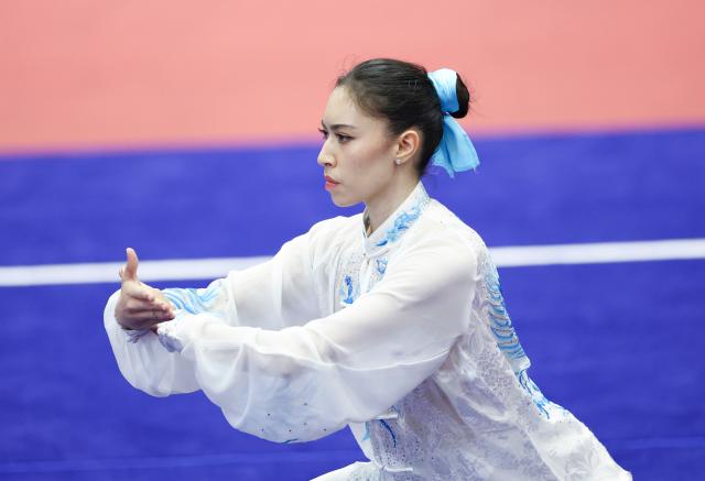 (260920) -- NAGOYA, Sept. 20, 2026 (Xinhua) -- Basma Lachkar of Brunei Darussalam competes during the Taijiquan round of the women's Taijiquan and Taijijian final at the 20th Asian Games Aichi-Nagoya 2026 in Nagoya, Japan, Sept. 20, 2026. (Xinhua/Long Lei)