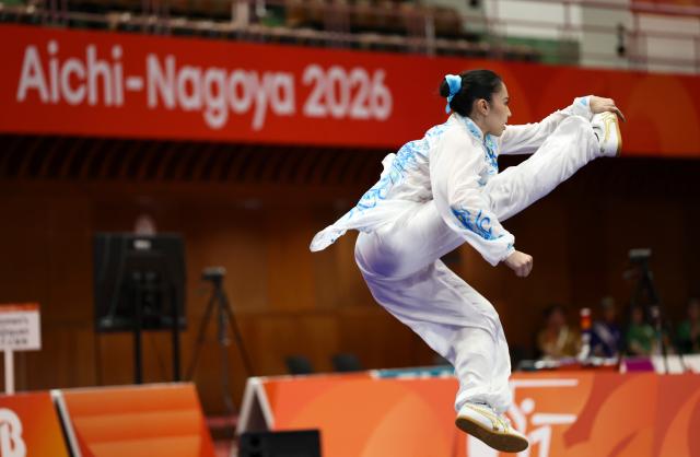 (260920) -- NAGOYA, Sept. 20, 2026 (Xinhua) -- Basma Lachkar of Brunei Darussalam competes during the Taijiquan round of the women's Taijiquan and Taijijian final at the 20th Asian Games Aichi-Nagoya 2026 in Nagoya, Japan, Sept. 20, 2026. (Xinhua/Wang Dongzhen)