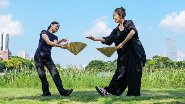 (260921) -- BEIJING, Sept. 21, 2026 (Xinhua) -- Vu Minh Anh (R) practices dancing by a lake with a student in Nanning, south China's Guangxi Zhuang Autonomous Region, Sept. 17, 2026.
  For 30-year-old Vietnamese choreographer Vu Minh Anh, China is an important country in her dance career. Her connection with Chinese dance began in childhood. At 11, she came to Guangxi through a China-ASEAN arts cooperation program to study dance at a school.
  After graduating in 2013, Vu returned to Vietnam and worked at a local theater. To pursue advanced professional training, she continued her studies at Guangxi Arts University in 2018, where she completed both her bachelor's and master's programs. She now teaches choreography at the university. (Xinhua/Zhang Ailin)