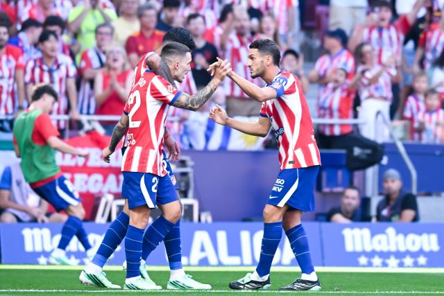 (260921) -- MADRID, Sept. 21, 2026 (Xinhua) -- Atletico de Madrid's players celebrate a goal during a La Liga football match between Atletico de Madrid and Real Madrid at Riyadh Air Metropolitano stadium in Madrid, Spain, on Sept. 20, 2026. (Photo by Gustavo Valiente/Xinhua)