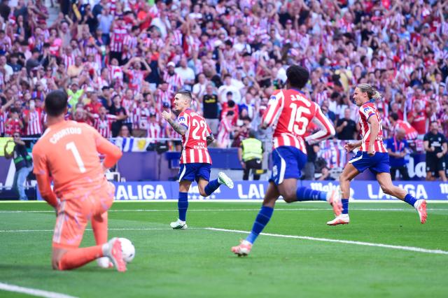 (260921) -- MADRID, Sept. 21, 2026 (Xinhua) -- Atletico de Madrid's players celebrate a goal during a La Liga football match between Atletico de Madrid and Real Madrid at Riyadh Air Metropolitano stadium in Madrid, Spain, on Sept. 20, 2026. (Photo by Gustavo Valiente/Xinhua)