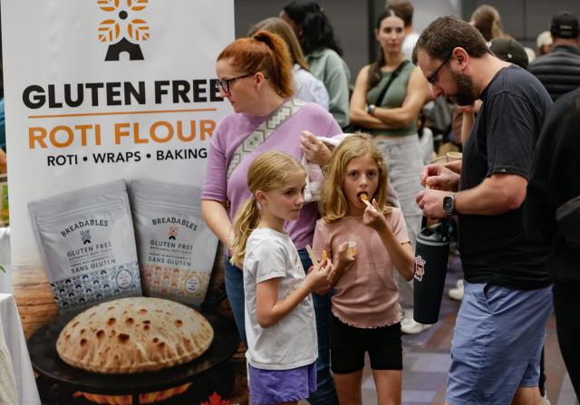 (260921) -- VANCOUVER, Sept. 21, 2026 (Xinhua) -- Visitors taste gluten free food products at the Gluten Free Expo in Vancouver, British Columbia, Canada, Sept. 20, 2026. The event featured gluten-free food and beverage products, sampling, shopping and educational presentations. (Photo by Liang Sen/Xinhua)