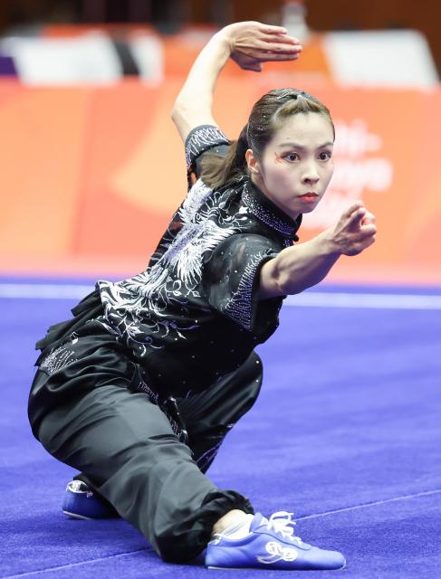 (260921) -- NAGOYA, Sept. 21, 2026 (Xinhua) -- Sou Cho Man of China's Macao competes during the Women's Changquan Final of Wushu at the 20th Asian Games Aichi-Nagoya 2026 in Nagoya of Aichi Prefecture, Japan, Sept. 21, 2026. (Xinhua/Long Lei)