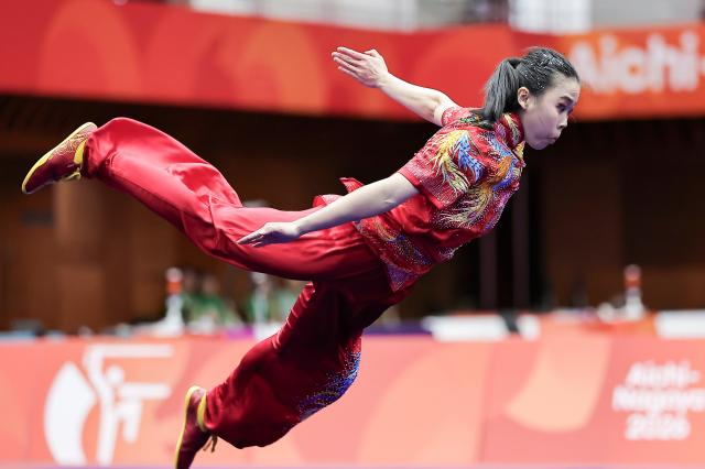 (260921) -- NAGOYA, Sept. 21, 2026 (Xinhua) -- Eugenia Diva Widodo of Indonesia competes during the Women's Changquan Final of Wushu at the 20th Asian Games Aichi-Nagoya 2026 in Nagoya of Aichi Prefecture, Japan, Sept. 21, 2026. (Xinhua/Long Lei)