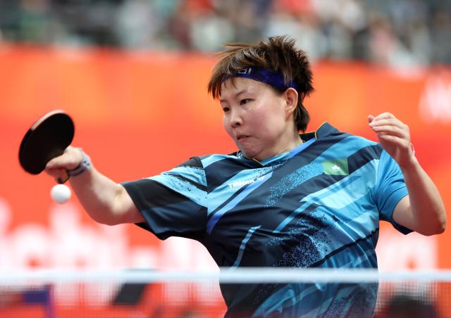(260921) -- NAGOYA, Sept. 21, 2026 (Xinhua) -- Zhu Yu Ling of team China's Macao hits a return to Nabita Shrestha of team Nepal during the women's team Group A table tennis match between China's Macao and Nepal at the 20th Asian Games Aichi-Nagoya 2026 in Toyota, Japan, Sept. 21, 2026. (Xinhua/Yao Qilin)