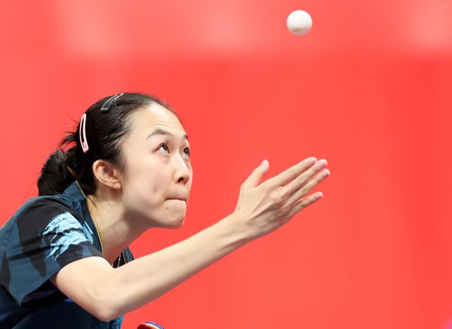 (260921) -- NAGOYA, Sept. 21, 2026 (Xinhua) -- Leong On Na of team China's Macao serves to Yonggi Poudel of team Nepal during the women's team Group A table tennis match between China's Macao and Nepal at the 20th Asian Games Aichi-Nagoya 2026 in Toyota, Japan, Sept. 21, 2026. (Xinhua/Yao Qilin)