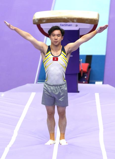 (260921) -- NAGOYA, Sept. 21, 2026 (Xinhua) -- Ng Ka Ki of China's Hong Kong reacts during the Vault of the Men's Qualification of Artistic Gymnastics at the 20th Asian Games Aichi-Nagoya 2026 in Nagoya of Aichi Prefecture, Japan, Sept. 21, 2026. (Xinhua/Jia Yuchen)