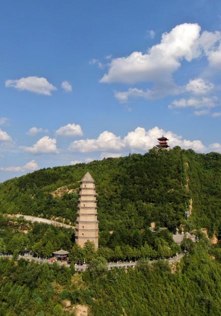 (260921) -- YAN'AN, Sept. 21, 2026 (Xinhua) -- A drone photo taken on Sept. 15, 2026 shows a view of the Baota Mountain in Yan'an City, northwest China's Shaanxi Province. At the end of 2025, the Xi'an-Yan'an high-speed railway began operation, formally integrating Yan'an into the national high-speed rail network. The railway has boosted tourism in Yan'an, which welcomed over 50 million domestic and international tourists in 2025.
  Once a revolutionary base, Yan'an has evolved into a city that is increasingly attractive as a place to live, work, and visit. (Xinhua/Li Yibo)