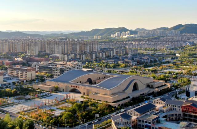(260921) -- YAN'AN, Sept. 21, 2026 (Xinhua) -- An aerial drone photo taken on Sept. 14, 2026 shows the Yan'an Museum in Yan'an City, northwest China's Shaanxi Province. At the end of 2025, the Xi'an-Yan'an high-speed railway began operation, formally integrating Yan'an into the national high-speed rail network. The railway has boosted tourism in Yan'an, which welcomed over 50 million domestic and international tourists in 2025.
  Once a revolutionary base, Yan'an has evolved into a city that is increasingly attractive as a place to live, work, and visit. (Xinhua/Li Yibo)