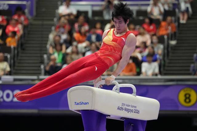 (260921) -- NAGOYA, Sept. 21, 2026 (Xinhua) -- Zhang Boheng of China competes on the pommel horse of the men's all-around final of Artistic Gymnastics at the 20th Asian Games Aichi-Nagoya 2026 in Nagoya, Japan, Sept. 21, 2026. (Xinhua/Lui Siu Wai)