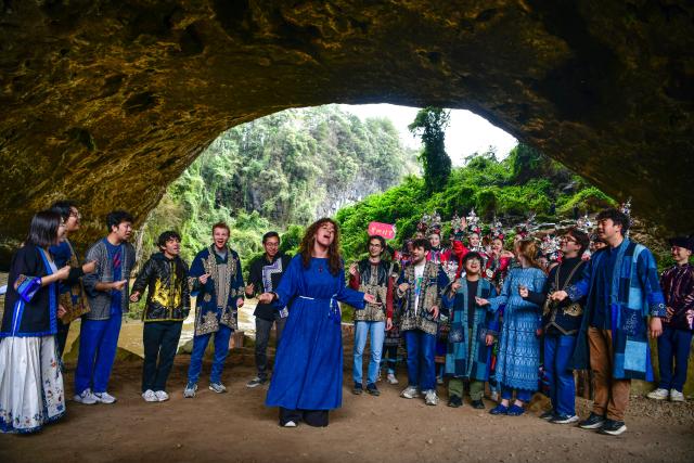 (260921) -- BEIJING, Sept. 21, 2026 (Xinhua) -- Members of the Whiffenpoofs a cappella choir of Yale University sing a song during a cultural exchange event with local youth in Liping County, Miao-Dong Autonomous Prefecture of Qiandongnan, southwest China's Guizhou Province, March 24, 2026. The hope of the China-U.S. relationship lies in the people, its foundation is in the societies, its future depends on the youth, and its vitality comes from exchanges at subnational levels.
   In recent years, the two countries have been strengthening people-to-people ties through cultural exchanges to inject sustained positive momentum into China-U.S relations. (Xinhua/Yang Wenbin)