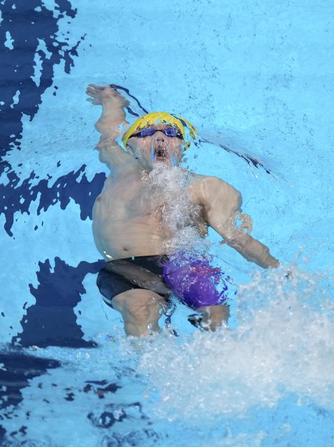 (260921) -- TOKYO, Sept. 21, 2026 (Xinhua) -- Xu Jiayu of China competes during the men's 50m backstroke final at the 20th Asian Games Aichi-Nagoya 2026 in Tokyo, Japan, Sept. 21, 2026. (Photo by Wang Shen/Xinhua)