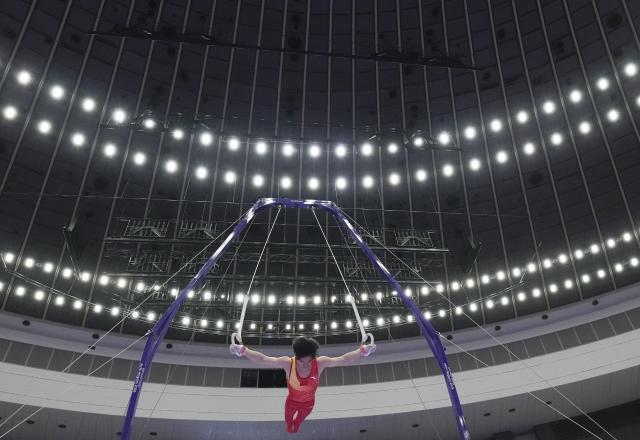 (260921) -- NAGOYA, Sept. 21, 2026 (Xinhua) -- Zhang Boheng of China competes in the rings of the men's all-around final of Artistic Gymnastics at the 20th Asian Games Aichi-Nagoya 2026 in Nagoya, Japan, Sept. 21, 2026. (Xinhua/Lui Siu Wai)