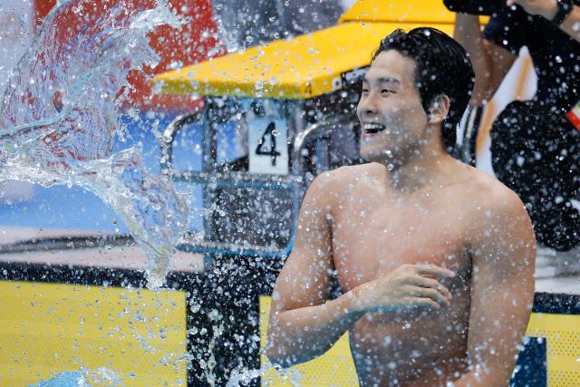(260921) -- TOKYO, Sept. 21, 2026 (Xinhua) -- Kim Youngbeom of South Korea celebrates after the men's 50m freestyle final at the 20th Asian Games Aichi-Nagoya 2026 in Tokyo, Japan, Sept. 21, 2026. (Xinhua/Wu Zhizun)