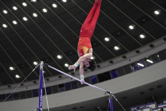 (260921) -- NAGOYA, Sept. 21, 2026 (Xinhua) -- Zhang Boheng of China competes on the horizontal bar of the men's all-around final of Artistic Gymnastics at the 20th Asian Games Aichi-Nagoya 2026 in Nagoya, Japan, Sept. 21, 2026. (Xinhua/Jia Yuchen)