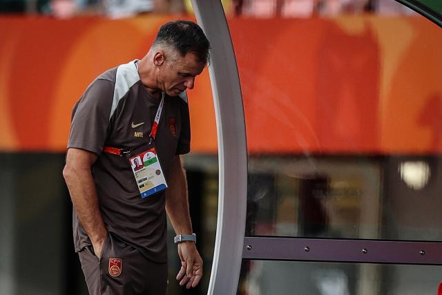 (260921) -- GIFU, Sept. 21, 2026 (Xinhua) -- Ante Milicic, head coach of team China, reacts during the group G match of Women's Football between China and the Philippines at 20th Asian Games Aichi-Nagoya 2026 in Gifu, Japan, Sept. 21, 2026. (Xinhua/Jia Haocheng)