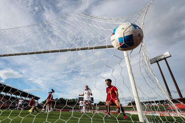 (260921) -- GIFU, Sept. 21, 2026 (Xinhua) -- Wang Yanwen (4th R) heads to score during the group G match of Women's Football between China and the Philippines at 20th Asian Games Aichi-Nagoya 2026 in Gifu, Japan, Sept. 21, 2026. (Xinhua/Jia Haocheng)