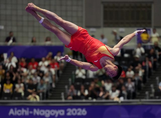 (260921) -- NAGOYA, Sept. 21, 2026 (Xinhua) -- Sun Wei of China competes during the floor exercise of the men's all-around final of Artistic Gymnastics at the 20th Asian Games Aichi-Nagoya 2026 in Nagoya, Japan, Sept. 21, 2026. (Xinhua/Jia Yuchen)