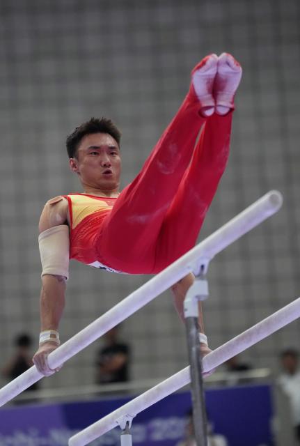 (260921) -- NAGOYA, Sept. 21, 2026 (Xinhua) -- Sun Wei of China competes on the parallel bars of the men's all-around final of Artistic Gymnastics at the 20th Asian Games Aichi-Nagoya 2026 in Nagoya, Japan, Sept. 21, 2026. (Xinhua/Jia Yuchen)