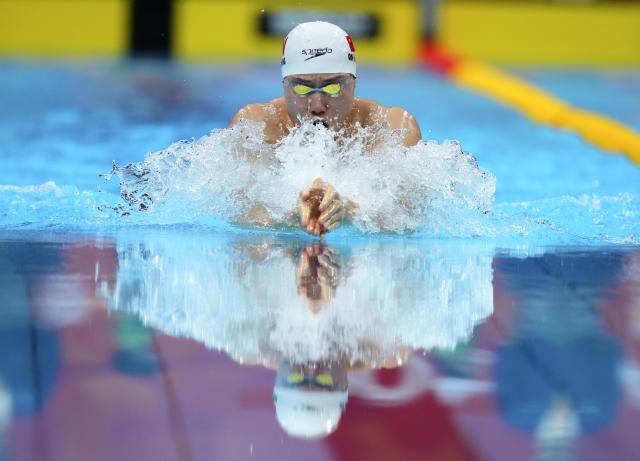 (260921) -- TOKYO, Sept. 21, 2026 (Xinhua) -- Qin Haiyang of China competes during the men's 100m breaststroke final at the 20th Asian Games Aichi-Nagoya 2026 in Tokyo, Japan, Sept. 21, 2026. (Xinhua/Chen Zeguo)
