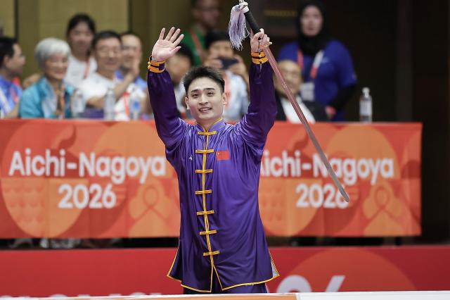 (260921) -- NAGOYA, Sept. 21, 2026 (Xinhua) -- Liu Dewen of China reacts after the Taijijian round of the men's Taijiquan and Taijijian final of Wushu at the 20th Asian Games Aichi-Nagoya 2026 in Nagoya of Aichi Prefecture, Japan, Sept. 21, 2026. (Xinhua/Long Lei)