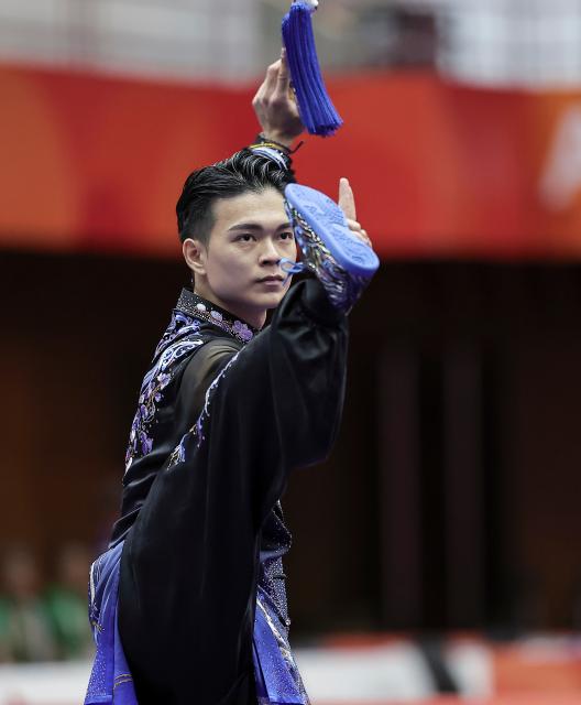 (260921) -- NAGOYA, Sept. 21, 2026 (Xinhua) -- Sun Chia-hung of Chinese Taipei performs during the Taijijian round of the men's Taijiquan and Taijijian final of Wushu at the 20th Asian Games Aichi-Nagoya 2026 in Nagoya of Aichi Prefecture, Japan, Sept. 21, 2026. (Xinhua/Long Lei)