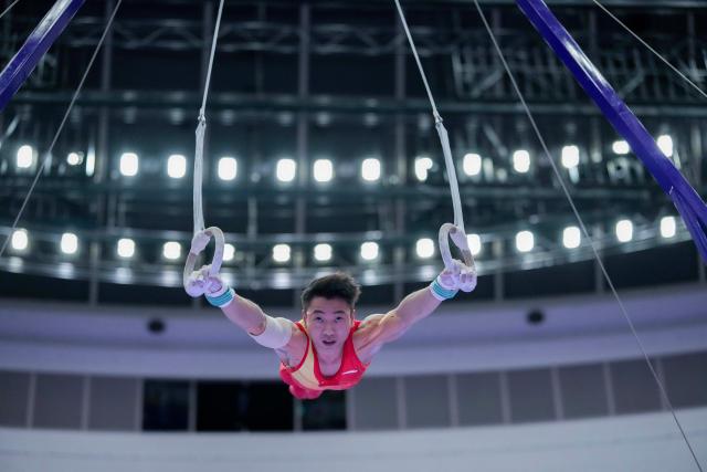(260921) -- NAGOYA, Sept. 21, 2026 (Xinhua) -- Zou Jingyuan of China competes in the rings of Artistic Gymnastics at the 20th Asian Games Aichi-Nagoya 2026 in Nagoya, Japan, Sept. 21, 2026. (Xinhua/Lui Siu Wai)