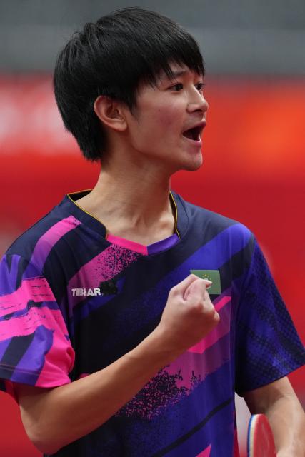 (260921) -- NAGOYA, Sept. 21, 2026 (Xinhua) -- Mak Tin Ian of Macao of China  celebrates against Abdullah Abdulhussein of Qatar during the men's team Group A table tennis match between Macao of China and Qatar at the 20th Asian Games Aichi-Nagoya 2026 in Toyota, Japan, Sept. 21, 2026. (Xinhua/Cheong Kam Ka)