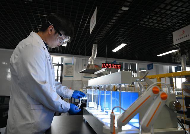 (260921) -- ZHENGZHOU, Sept. 21, 2026 (Xinhua) -- Lu Yi participates in a simulated competition training at a training base of Henan Chemical Technician College in Kaifeng City, central China's Henan Province, Sept. 1, 2026. At a training base of Henan Chemical Technician College, 23-year-old Lu Yi is preparing for the water technology event of the upcoming 48th WorldSkills Competition.
  Lu enrolled at Henan Chemical Technician College in 2019 and began training for the water technology event three years later. The water technology event focuses on evaluating competitors' abilities in wastewater treatment process operations, water quality analysis, mechanical equipment maintenance, and electrical automation. In 2025, Lu won the gold medal in the water technology event at China's third Vocational Skills Competition.
  During his daily training for the upcoming 48th WorldSkills Competition, Lu spends almost all his time in the laboratory, working with his coach to improve speed and adjust every detail of his movements. (Xinhua/Hao Yuan)