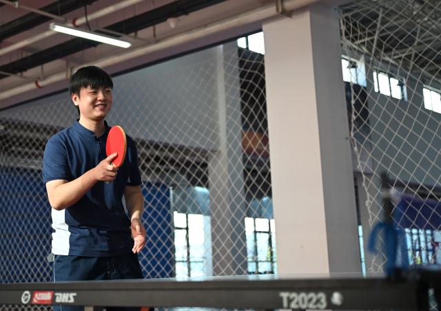 (260921) -- ZHENGZHOU, Sept. 21, 2026 (Xinhua) -- Lu Yi plays table tennis at Henan Chemical Technician College in Kaifeng City, central China's Henan Province, Sept. 1, 2026. At a training base of Henan Chemical Technician College, 23-year-old Lu Yi is preparing for the water technology event of the upcoming 48th WorldSkills Competition.
  Lu enrolled at Henan Chemical Technician College in 2019 and began training for the water technology event three years later. The water technology event focuses on evaluating competitors' abilities in wastewater treatment process operations, water quality analysis, mechanical equipment maintenance, and electrical automation. In 2025, Lu won the gold medal in the water technology event at China's third Vocational Skills Competition.
  During his daily training for the upcoming 48th WorldSkills Competition, Lu spends almost all his time in the laboratory, working with his coach to improve speed and adjust every detail of his movements. (Xinhua/Hao Yuan)