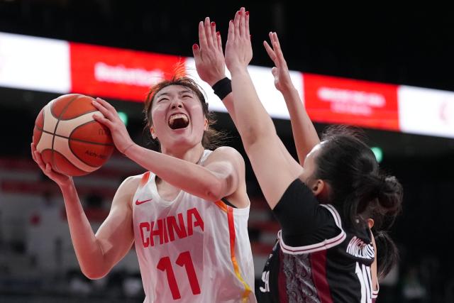 (260921) -- NAGOYA, Sept. 21, 2026 (Xinhua) -- Luo Xinyu (L) of China competes during the women's group A basketball match between China and Indonesia at the 20th Asian Games Aichi-Nagoya 2026 in Nagoya, Japan, Sept. 21, 2026. (Xinhua/Luo Yuan)