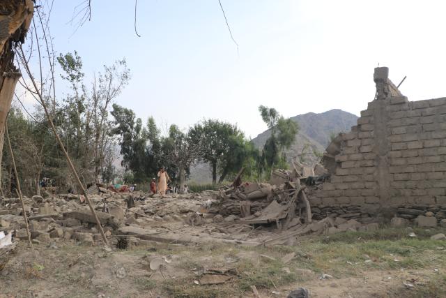 (260921) -- KABUL, Sept. 21, 2026 (Xinhua) -- Residents inspect a damaged house following an airstrike in a village in Nurgal district of Kunar province, Afghanistan, Sept. 21, 2026. At least three people were killed after the Pakistani air force carried out airstrikes early Monday in Afghanistan's eastern Kunar and Paktika provinces bordering Pakistan, Afghan media outlet Tolonews reported, citing Afghan government officials. (Photo by Qazafi Mal/Xinhua)