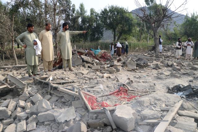 (260921) -- KABUL, Sept. 21, 2026 (Xinhua) -- Residents inspect a damaged house following an airstrike in a village in Nurgal district of Kunar province, Afghanistan, Sept. 21, 2026. At least three people were killed after the Pakistani air force carried out airstrikes early Monday in Afghanistan's eastern Kunar and Paktika provinces bordering Pakistan, Afghan media outlet Tolonews reported, citing Afghan government officials. (Photo by Qazafi Mal/Xinhua)