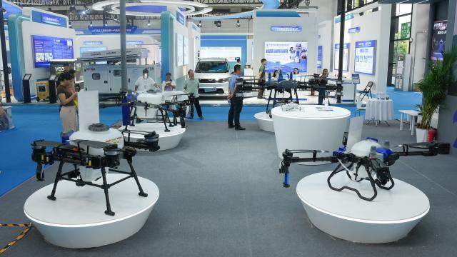 (260921) -- NANNING, Sept. 21, 2026 (Xinhua) -- This photo taken on Sept. 21, 2026 shows drones at the 23rd China-ASEAN Expo in Nanning, south China's Guangxi Zhuang Autonomous Region. The 23rd China-ASEAN Expo features an exhibition area on future space, showcasing equipment such as drones and satellite navigation systems. (Xinhua/Zhang Ailin)