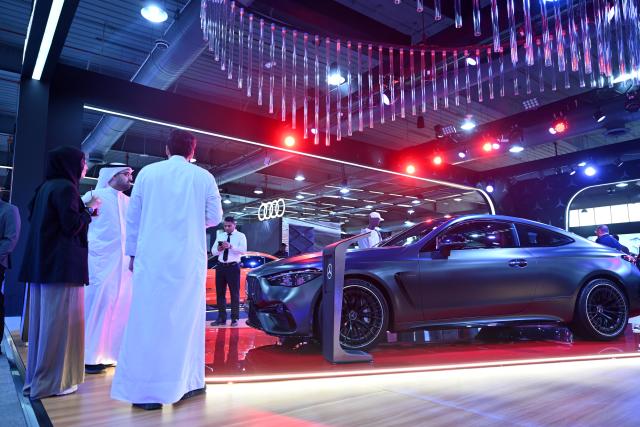 (260921) -- HAWALLI GOVERNORATE, Sept. 21, 2026 (Xinhua) -- People visit an auto show in Hawalli Governorate, Kuwait, Sept. 21, 2026. An auto show opened at the Kuwait International Fairground in Hawalli Governorate on Monday. (Photo by Asad/Xinhua)