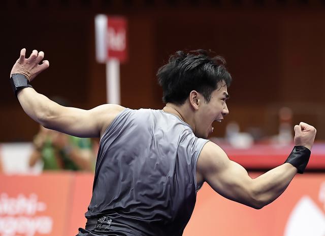 (260922) -- NAGOYA, Sept. 22, 2026 (Xinhua) -- Li Jianming of China competes during the Nanquan round of the men's Nanquan and Nangun final of Wushu at the 20th Asian Games Aichi-Nagoya 2026 in Nagoya of Aichi Prefecture, Japan, Sept. 22, 2026. (Xinhua/Long Lei)