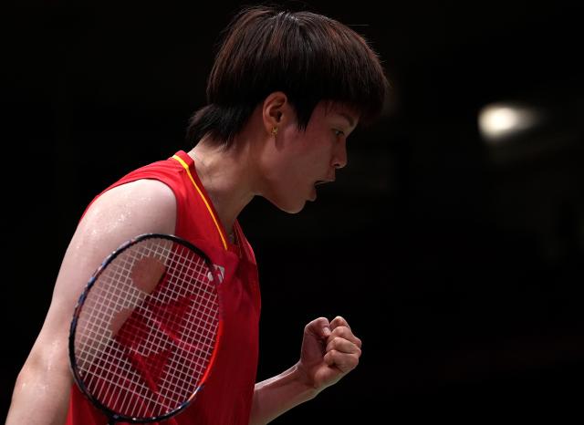 (260922) -- ICHINOMIYA, Sept. 22, 2026 (Xinhua) -- Wang Zhiyi of team China reacts in the singles match against Ratchanok Intanon of Thailand during the badminton women's team quarterfinals between China and Thailand at the 20th Asian Games Aichi-Nagoya 2026 in Ichinomiya of Aichi Prefecture, Japan, Sept. 22, 2026. (Xinhua/Li Bo)
