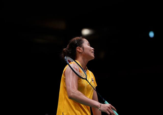 (260922) -- ICHINOMIYA, Sept. 22, 2026 (Xinhua) -- Ratchanok Intanon of Thailand reacts in the singles match against Wang Zhiyi of China during the badminton women's team quarterfinals between China and Thailand at the 20th Asian Games Aichi-Nagoya 2026 in Ichinomiya of Aichi Prefecture, Japan, Sept. 22, 2026. (Xinhua/Li Bo)