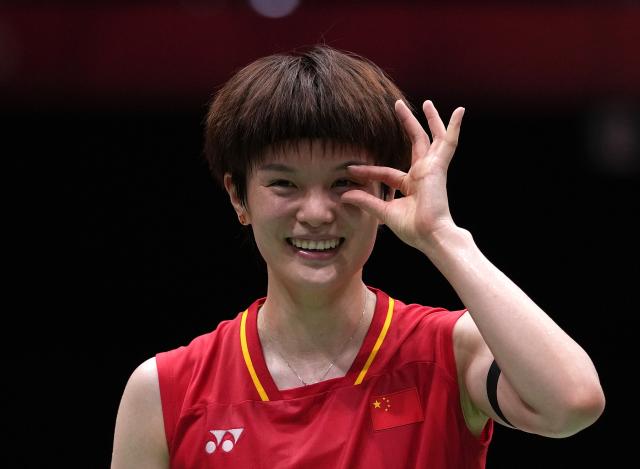 (260922) -- ICHINOMIYA, Sept. 22, 2026 (Xinhua) -- Wang Zhiyi of team China celebrates after winning the singles match against Ratchanok Intanon of team Thailand during the badminton women's team quarterfinals between China and Thailand at the 20th Asian Games Aichi-Nagoya 2026 in Ichinomiya, Japan, Sept. 22, 2026. (Xinhua/Li Bo)