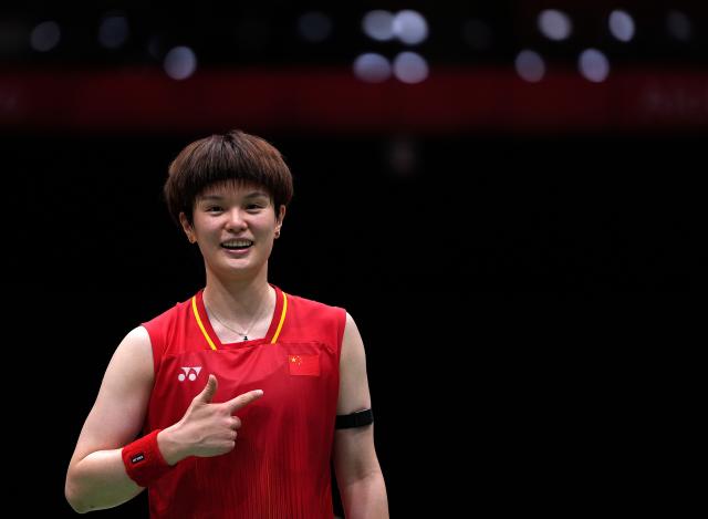 (260922) -- ICHINOMIYA, Sept. 22, 2026 (Xinhua) -- Wang Zhiyi of team China celebrates after winning the singles match against Ratchanok Intanon of team Thailand during the badminton women's team quarterfinals between China and Thailand at the 20th Asian Games Aichi-Nagoya 2026 in Ichinomiya, Japan, Sept. 22, 2026. (Xinhua/Li Bo)