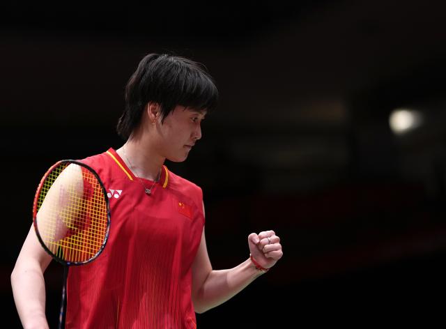 (260922) -- ICHINOMIYA, Sept. 22, 2026 (Xinhua) -- Chen Yufei of team China celebrates scoring in the singles match against Pornpawee Chochuwong of team Thailand during the badminton women's team quarterfinals between China and Thailand at the 20th Asian Games Aichi-Nagoya 2026 in Ichinomiya, Japan, Sept. 22, 2026. (Xinhua/Li Bo)