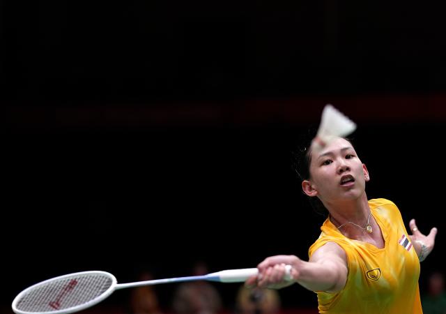 (260922) -- ICHINOMIYA, Sept. 22, 2026 (Xinhua) -- Pornpawee Chochuwong of team Thailand hits a return in the singles match against Chen Yufei of team China during the badminton women's team quarterfinals between China and Thailand at the 20th Asian Games Aichi-Nagoya 2026 in Ichinomiya, Japan, Sept. 22, 2026. (Xinhua/Li Bo)