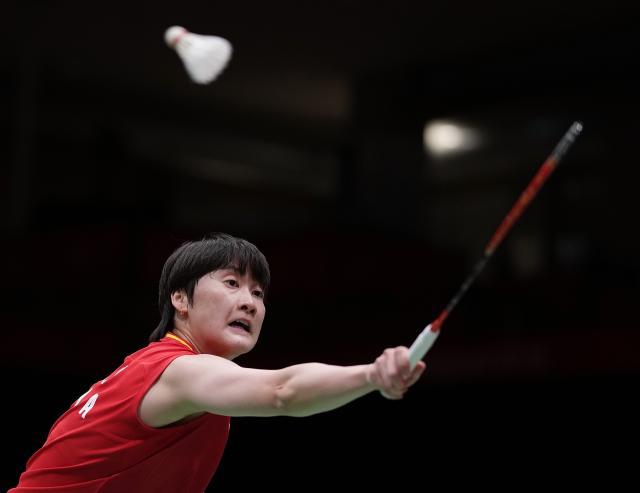 (260922) -- ICHINOMIYA, Sept. 22, 2026 (Xinhua) -- Chen Yufei of team China hits a return in the singles match against Pornpawee Chochuwong of team Thailand during the badminton women's team quarterfinals between China and Thailand at the 20th Asian Games Aichi-Nagoya 2026 in Ichinomiya, Japan, Sept. 22, 2026. (Xinhua/Li Bo)
