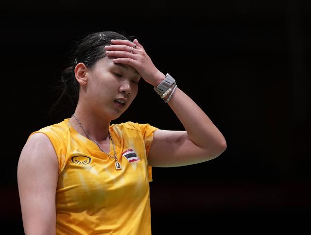 (260922) -- ICHINOMIYA, Sept. 22, 2026 (Xinhua) -- Pornpawee Chochuwong of team Thailand reacts in the singles match against Chen Yufei of team China during the badminton women's team quarterfinals between China and Thailand at the 20th Asian Games Aichi-Nagoya 2026 in Ichinomiya, Japan, Sept. 22, 2026. (Xinhua/Li Bo)