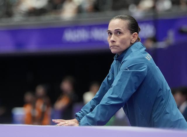 (260922) -- NAGOYA, Sept. 22, 2026 (Xinhua) -- Oksana Chusovitina of Uzbekistan is seen before the women's vault qualification of Artistic Gymnastics at the 20th Asian Games Aichi-Nagoya 2026 in Nagoya, Japan, Sept. 22, 2026. (Xinhua/Lui Siu Wai)
