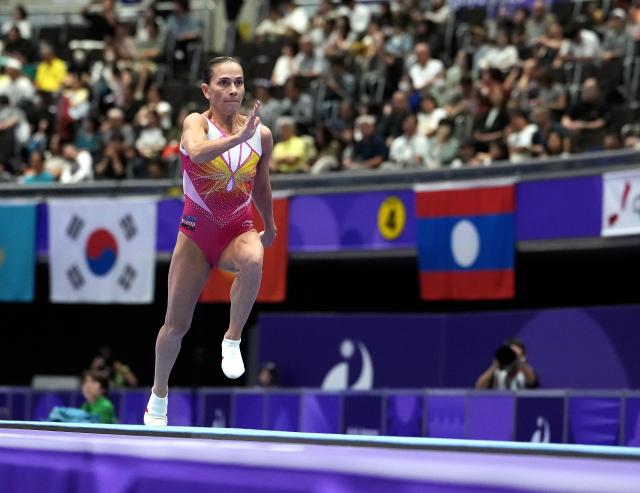 (260922) -- NAGOYA, Sept. 22, 2026 (Xinhua) -- Oksana Chusovitina of Uzbekistan warms up before the women's vault qualification of Artistic Gymnastics at the 20th Asian Games Aichi-Nagoya 2026 in Nagoya, Japan, Sept. 22, 2026. (Xinhua/Lui Siu Wai)